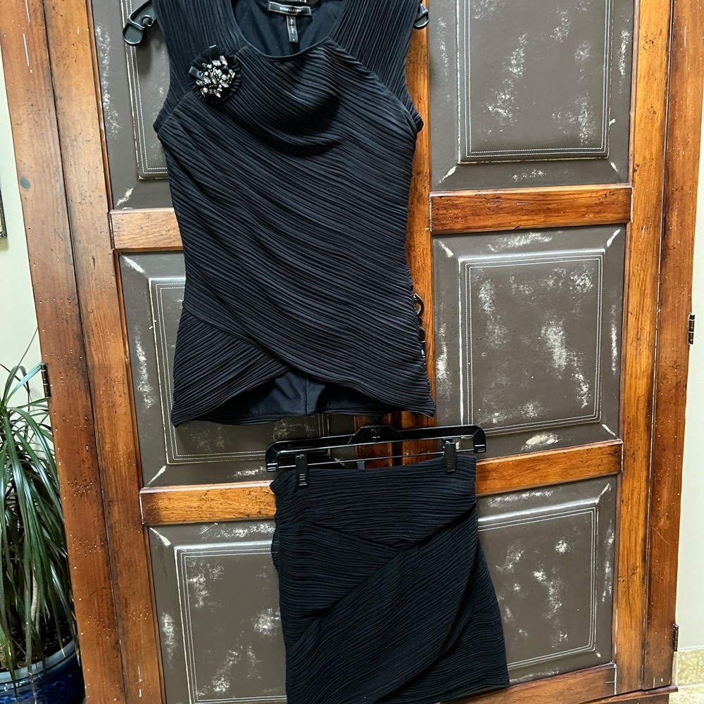 BCBG Maxazira Black cocktail top with brooch and skirt. Size 4